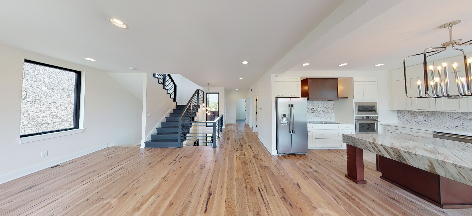 Open-concept interior of a completed Entrepreneurs Enterprises new-construction home in the Beacon Hill neighborhood of Kansas City